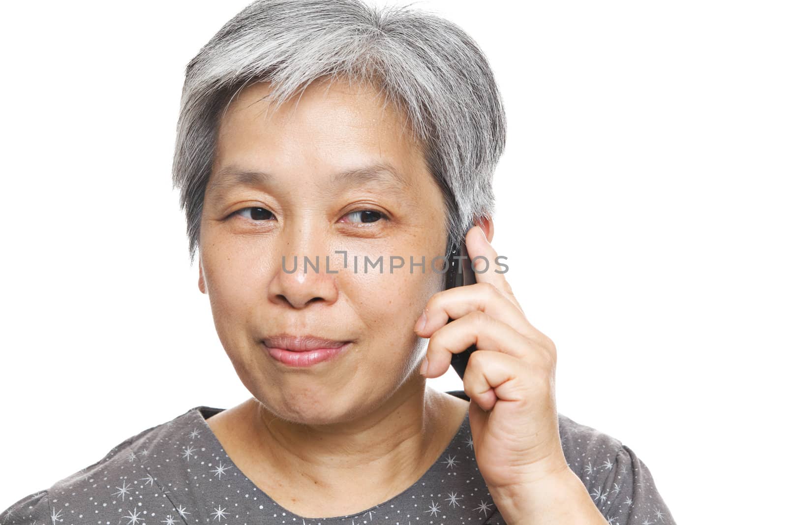 mature woman using mobile phone