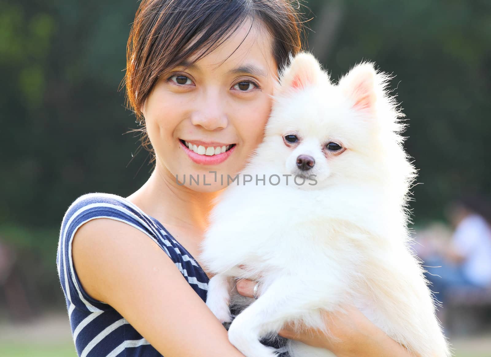Young girl with dog by leungchopan