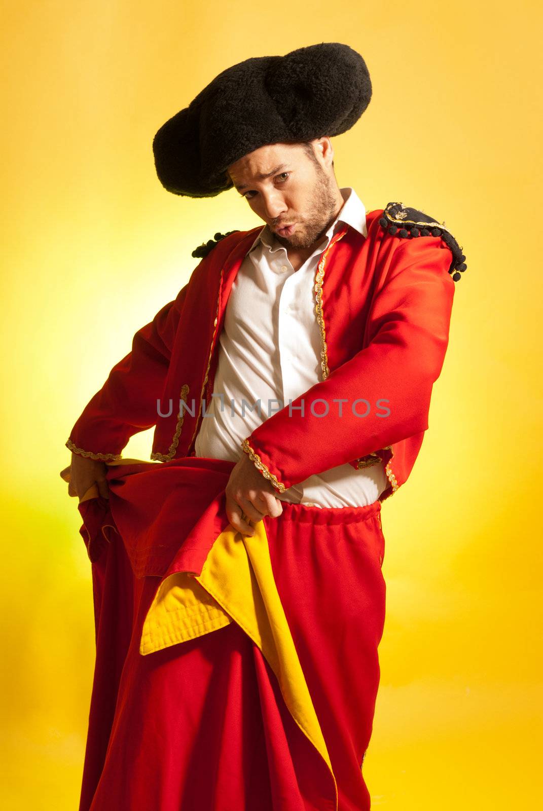Bullfighter courage red yellow humor spanish colors  by dgmata