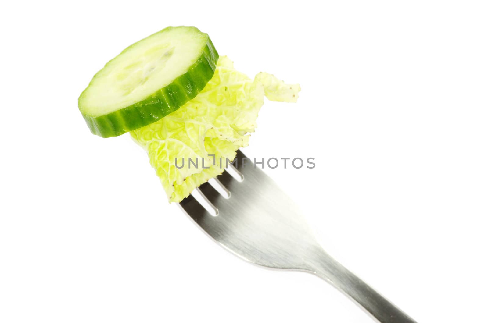 fresh cucumber on a fork