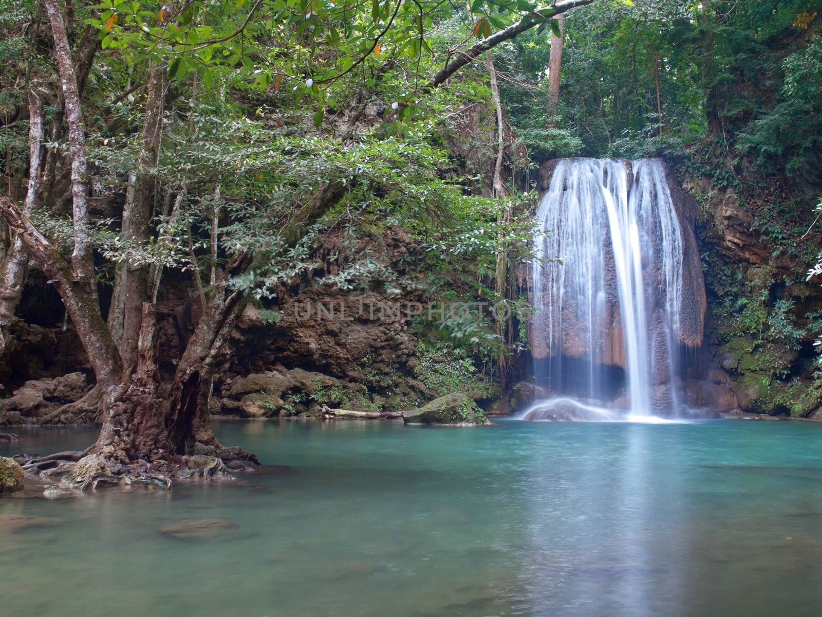 Emerald color water in tier third of Erawan waterfall, Erawan National Park, Kanchanaburi, Thailand