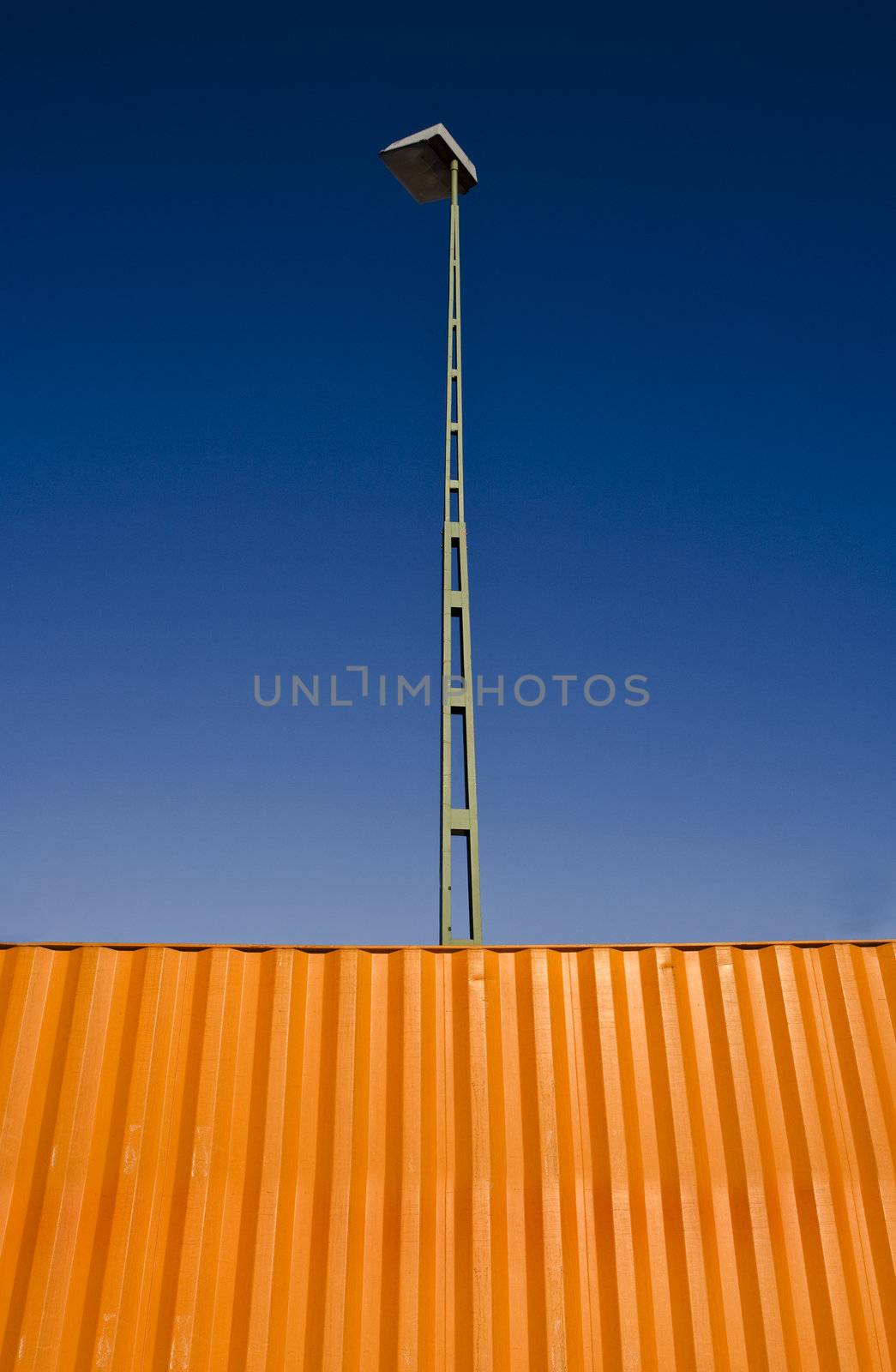 Orange Cargo Container towards blue sky