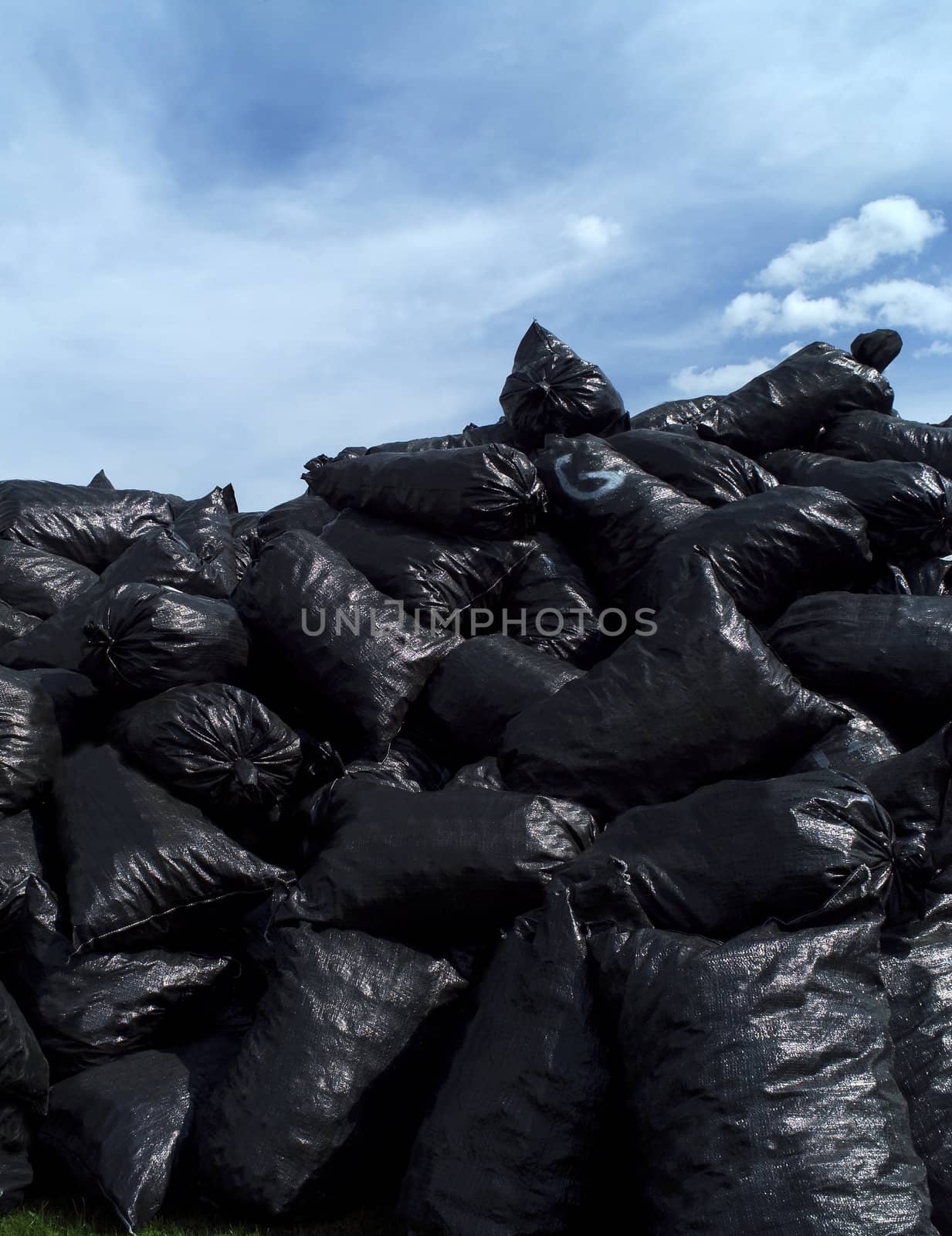 Large group of Garbage Bags towards blue sky