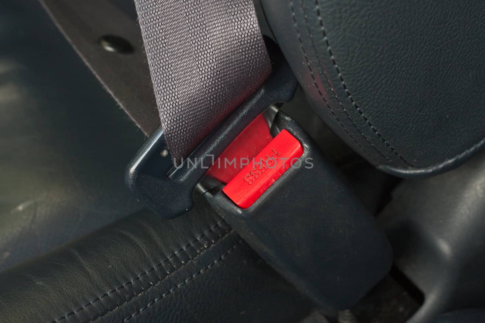 Close up image of  a fastened seat beltseatbelt,