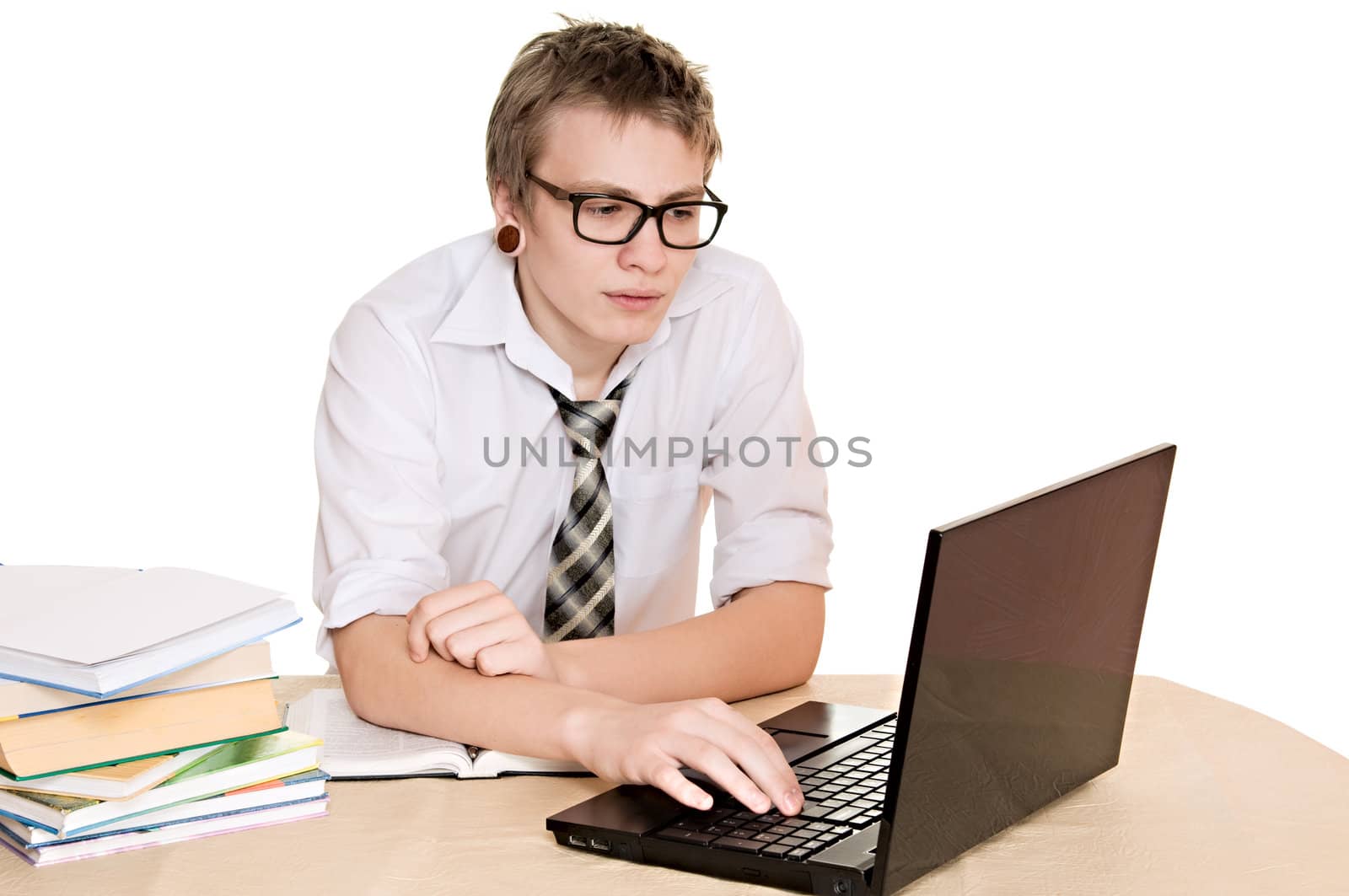 a male student works on the laptop isolated on white background