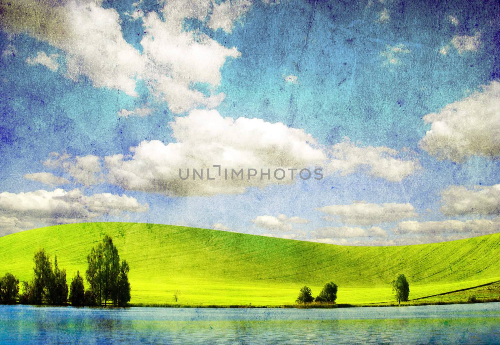 grunge image of green field and blue sky