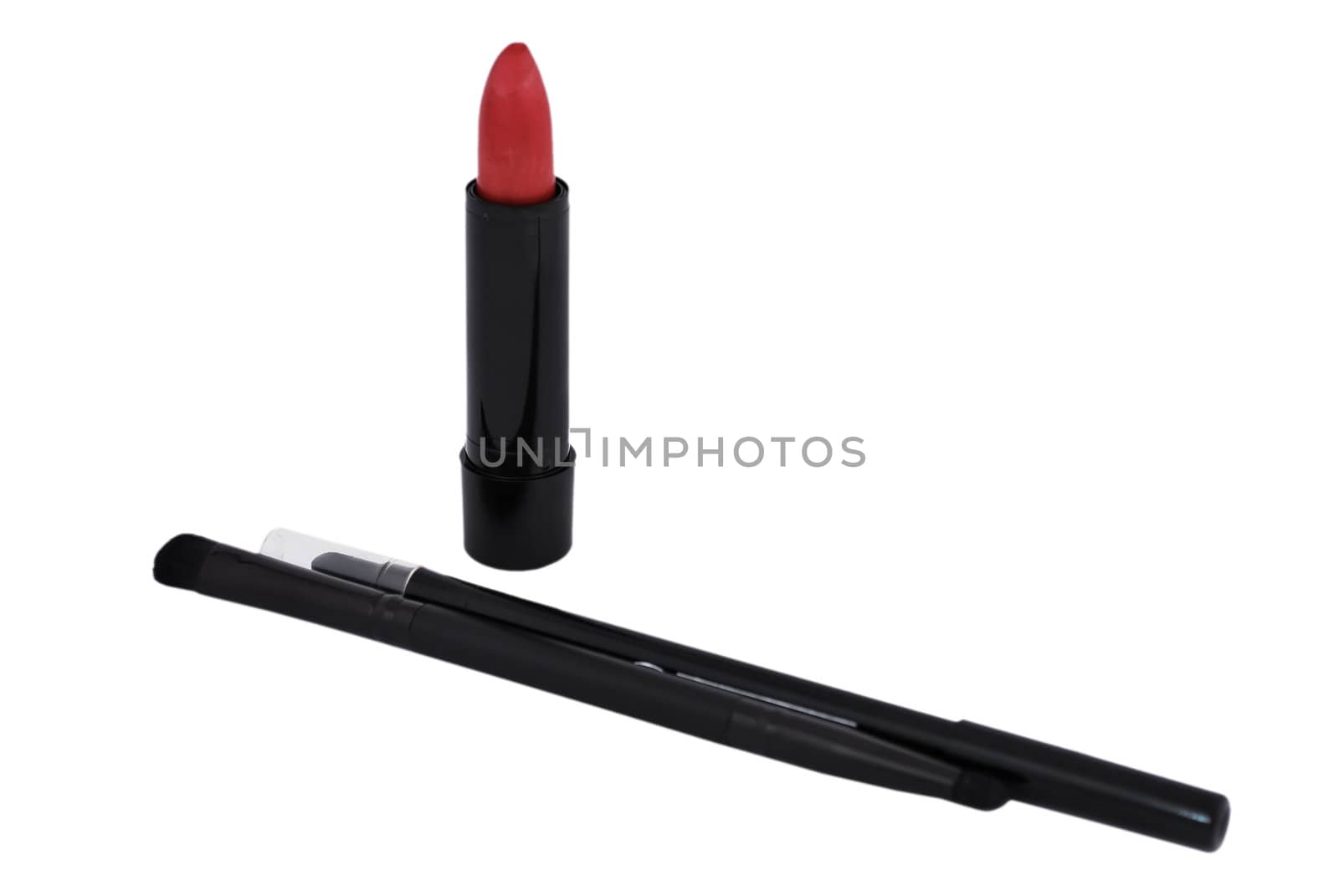 eye shadow and lipstick on a white background