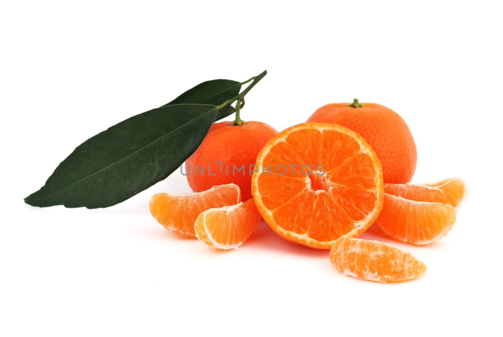 tangerines with leaves on white background