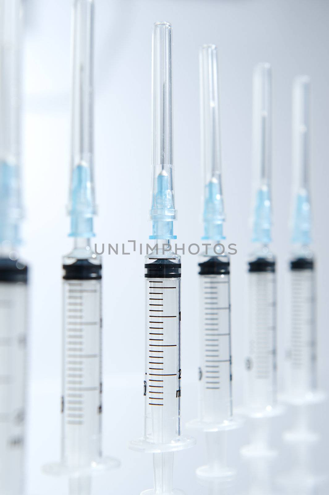 A 2ml syringe and needle. Blur by MOELLERTHOMSEN