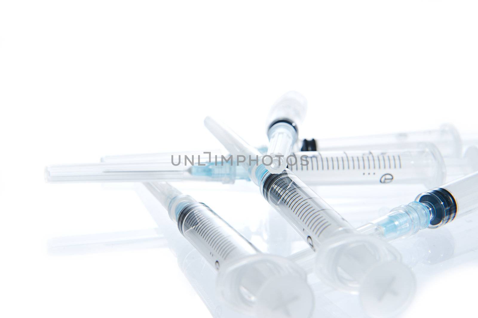 A 2ml syringe and needle. Disposable syringe. Blur