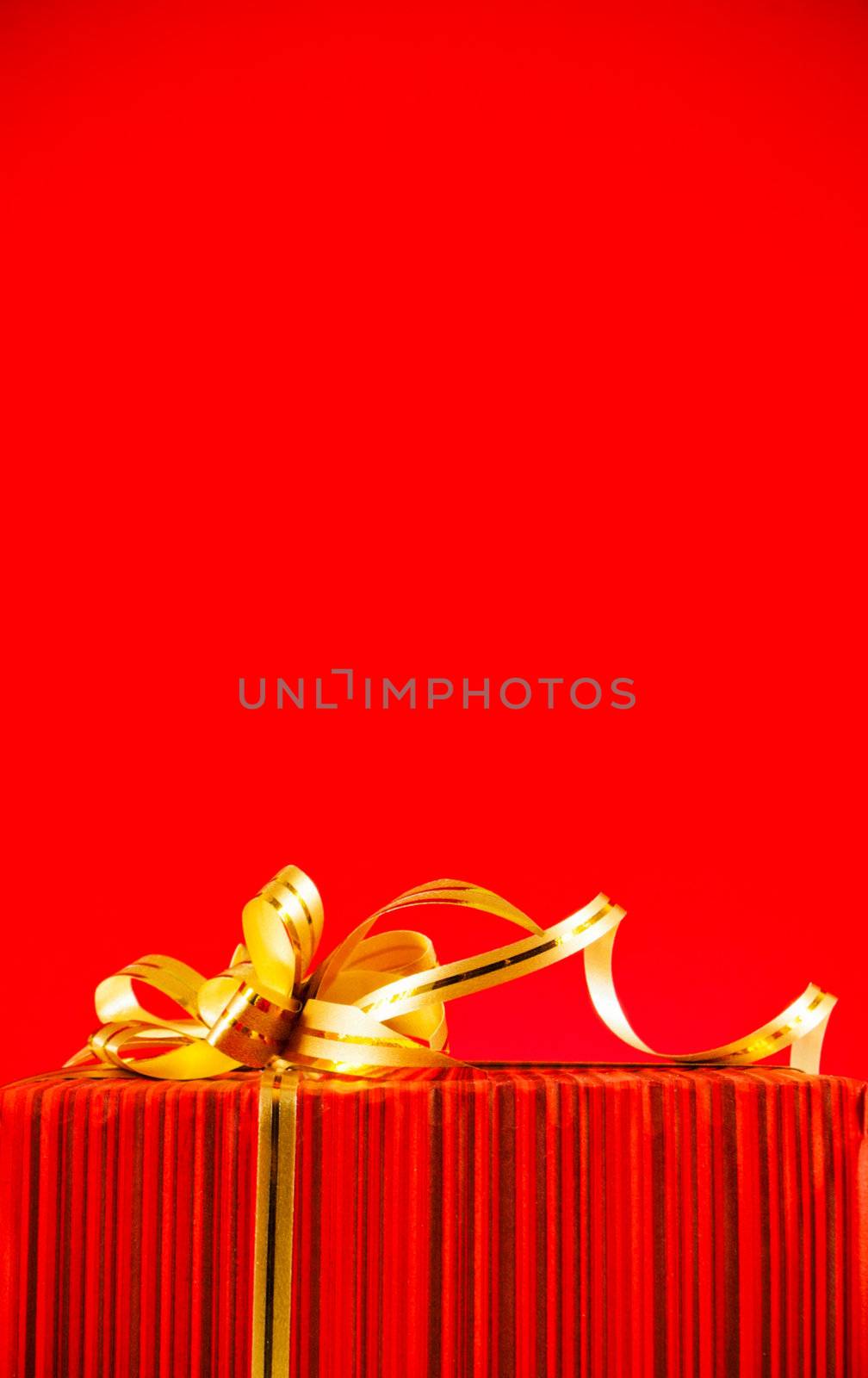 Wrapped box against red background