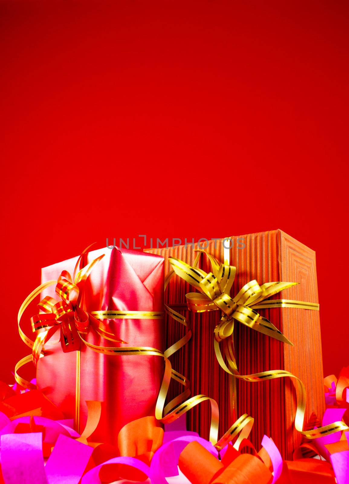Presents in red boxes against red background