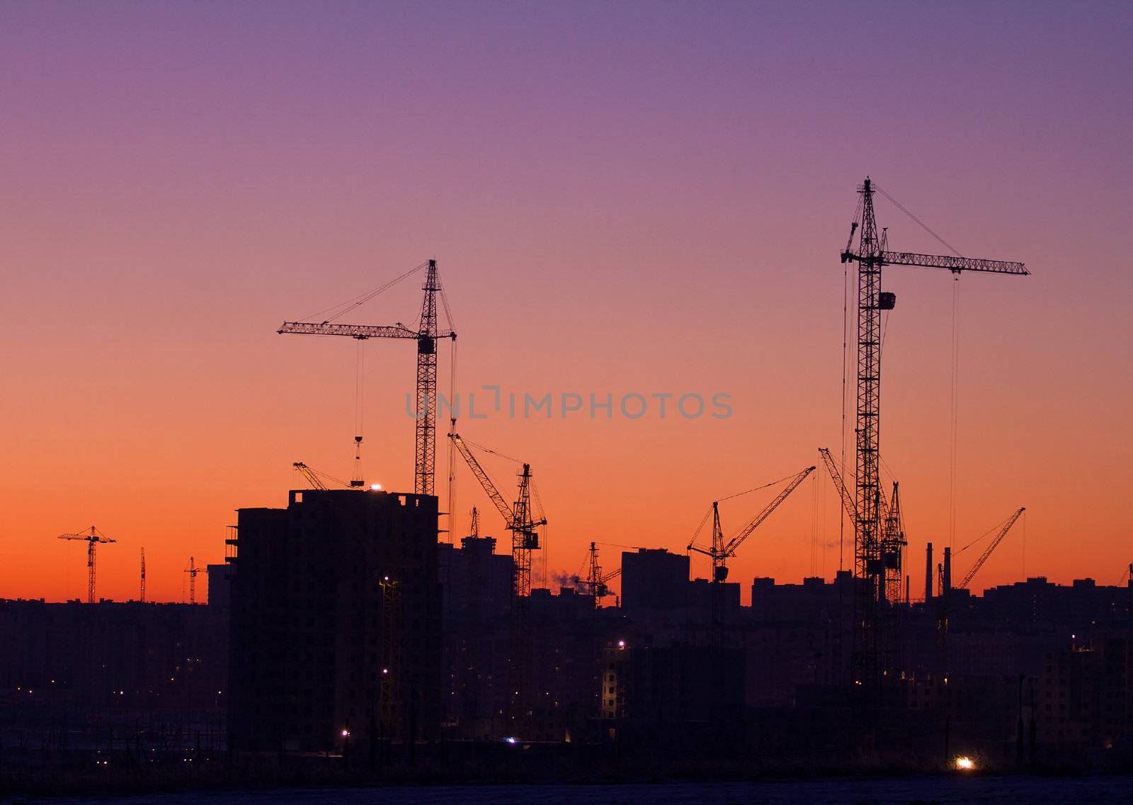 city under construction on sunrise