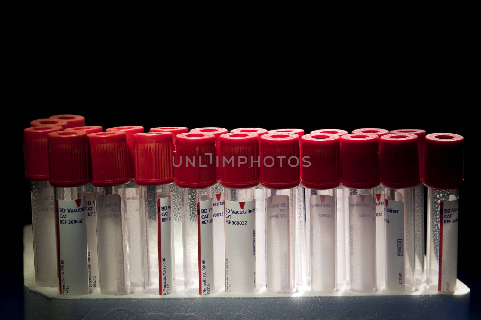 Red headed test tubes placed at two lines