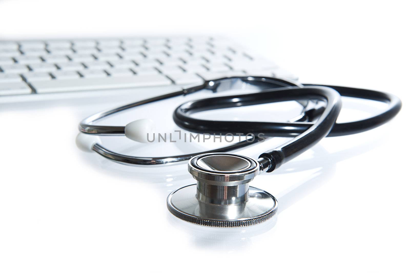 Stethoscope on doctos desk. On white background