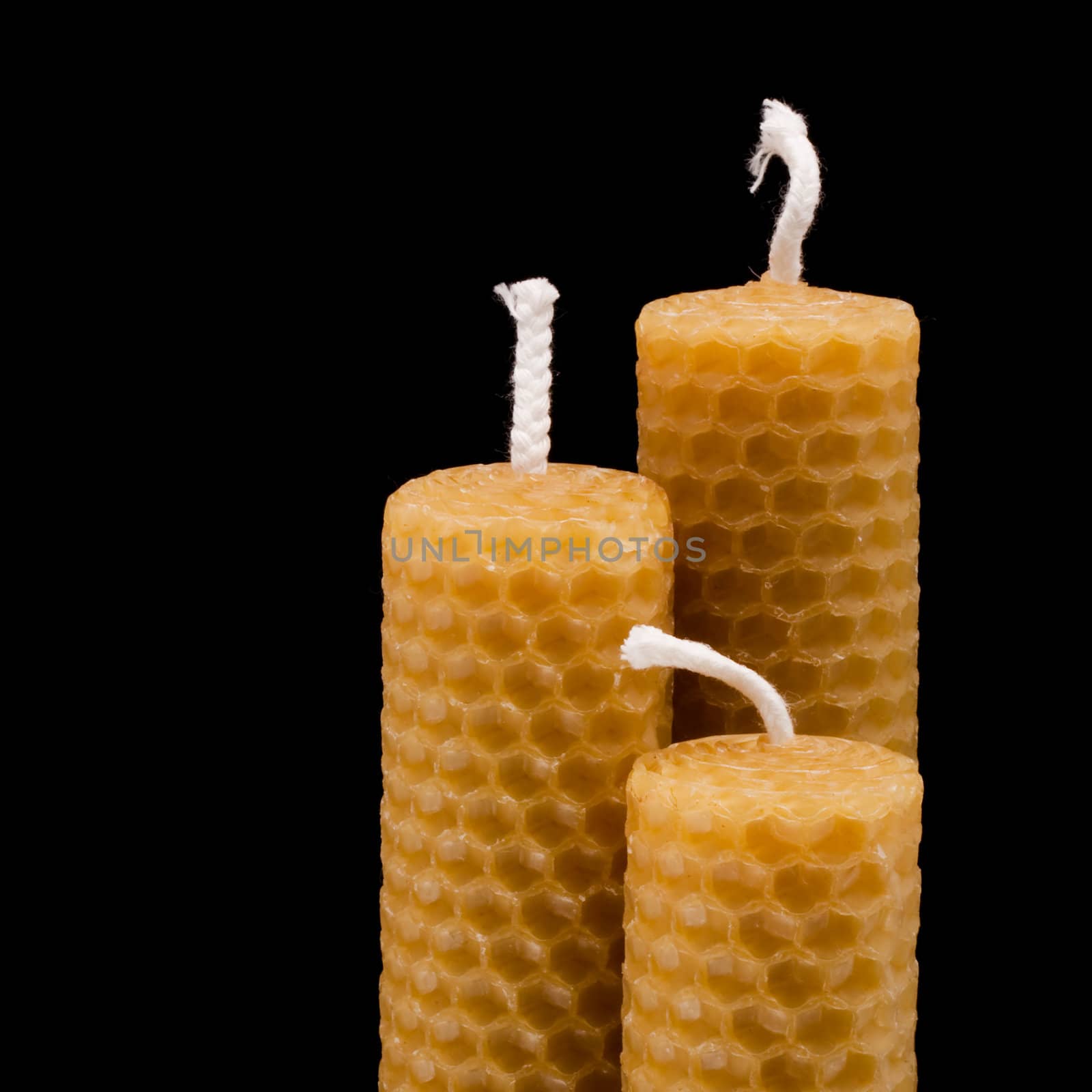 three besswax candles