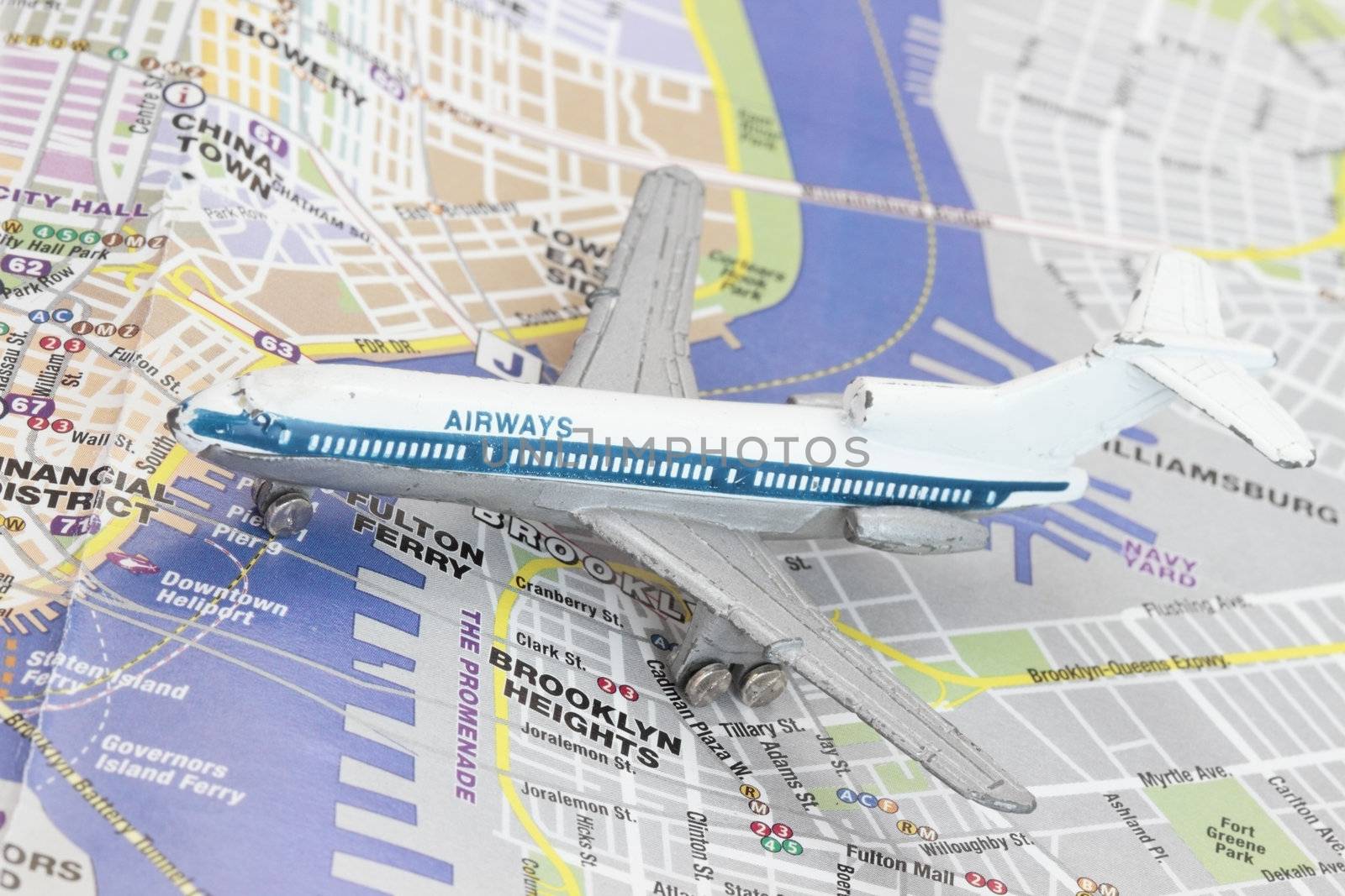 Toy Airplane on map of New York. Shallow depth of field from use of macro lens 
