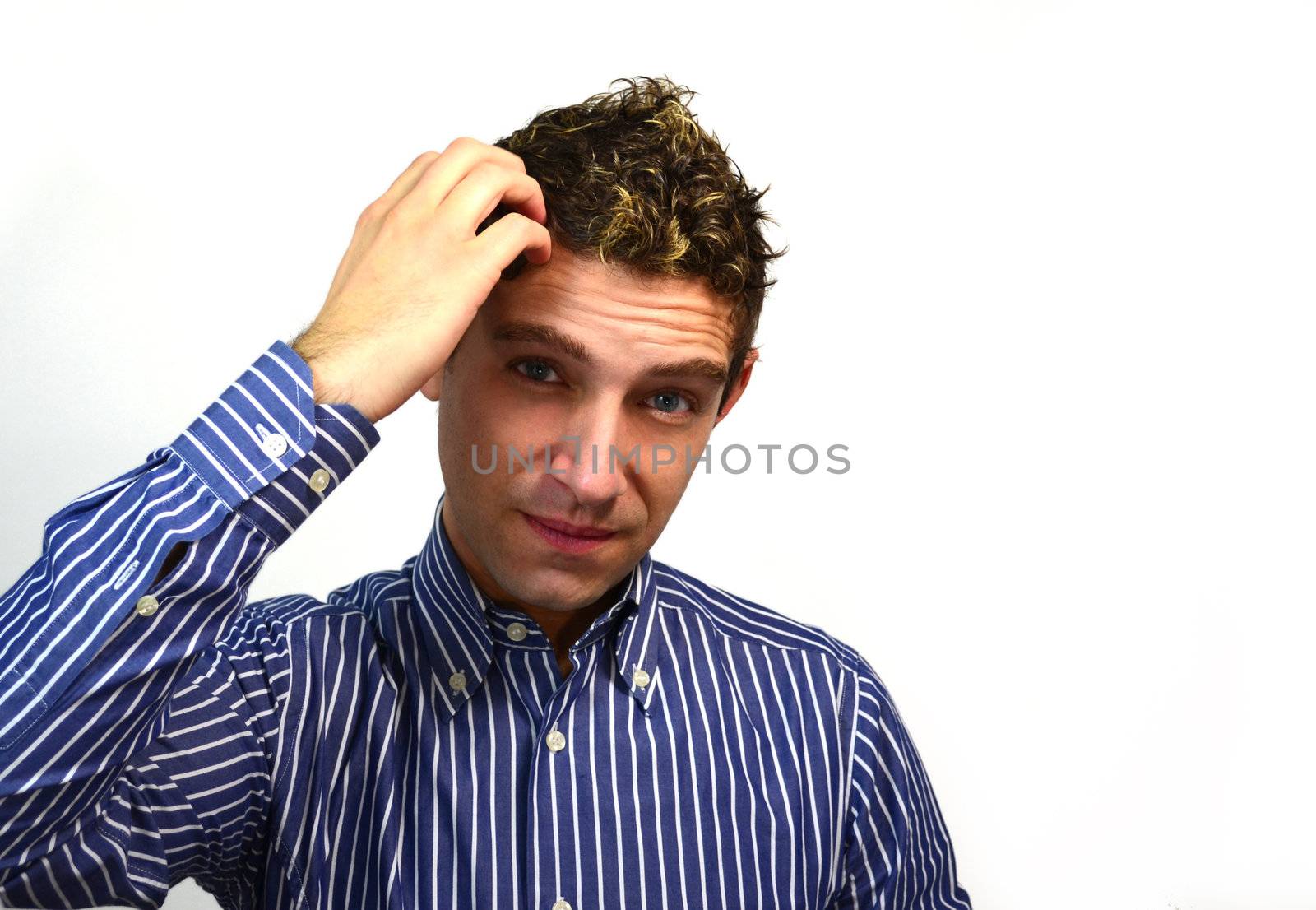 Attractive guy scratching his head by artofphoto