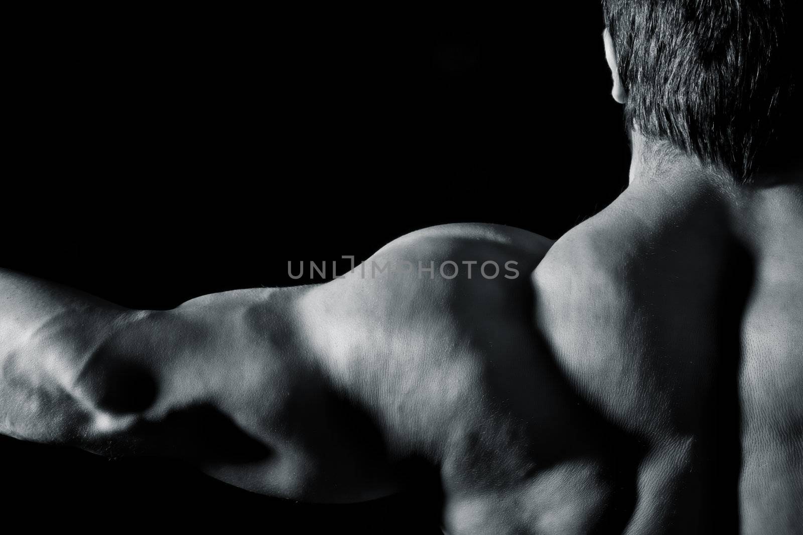 An image of a muscular sports man back