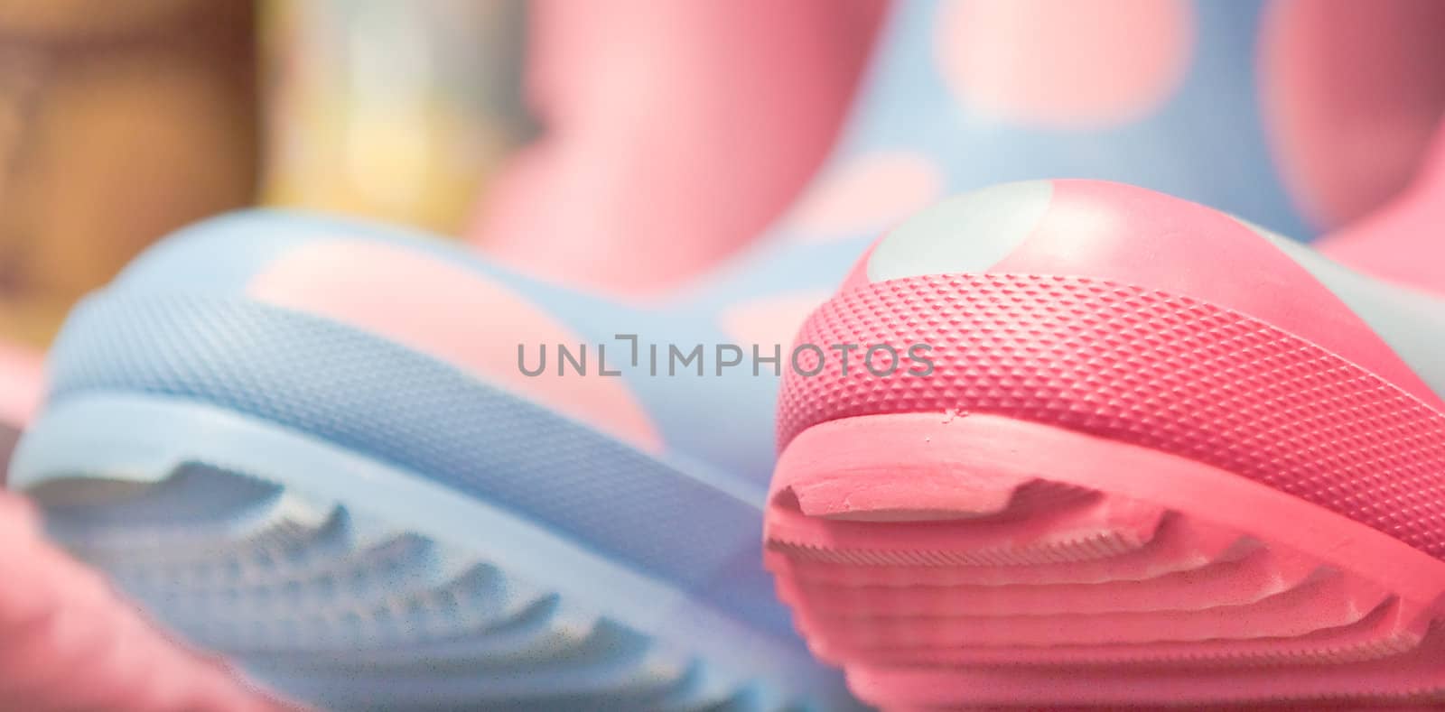 Brightly coloured wellington boots with shallow depth of field