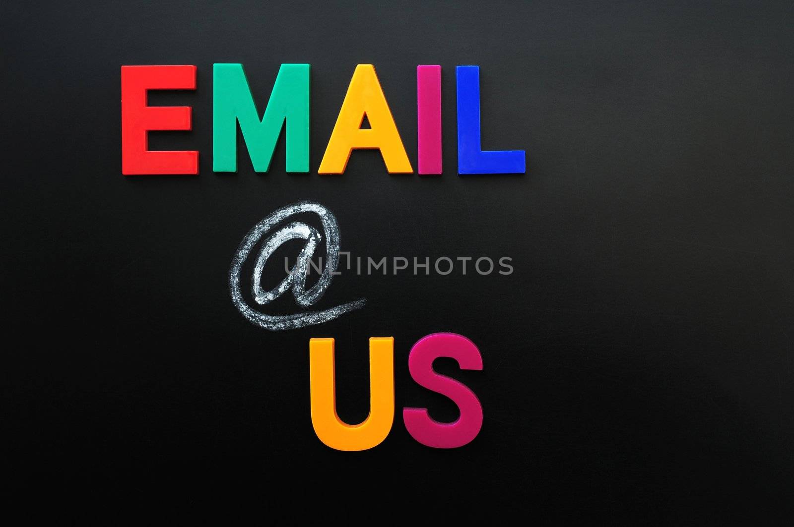 Email us made of colorful letters on a blackboard