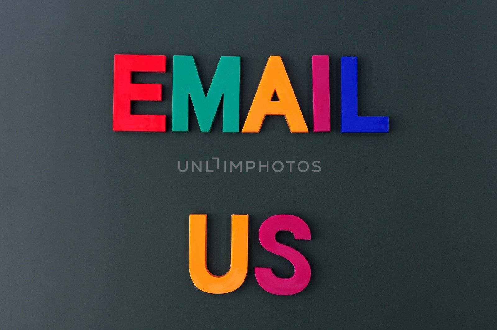 Email us made of colorful letters on a blackboard