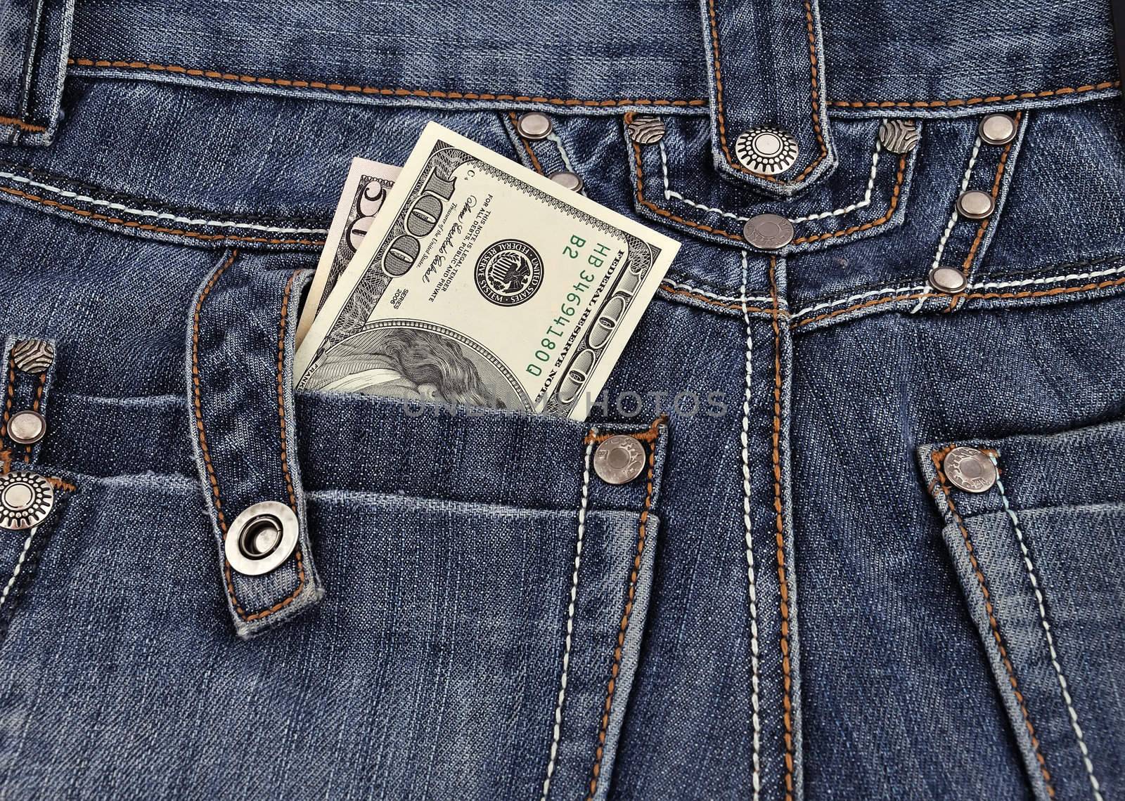 dollars in his back pocket Jeans. close-up