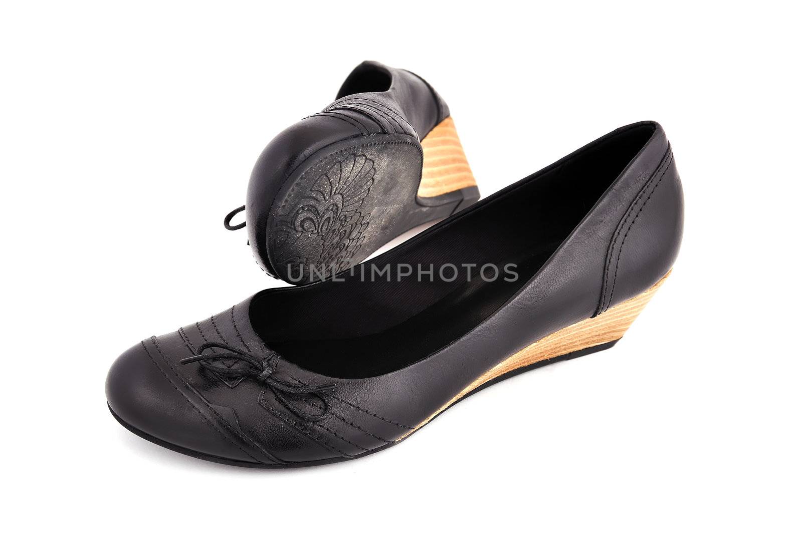black ladies shoes on a white background