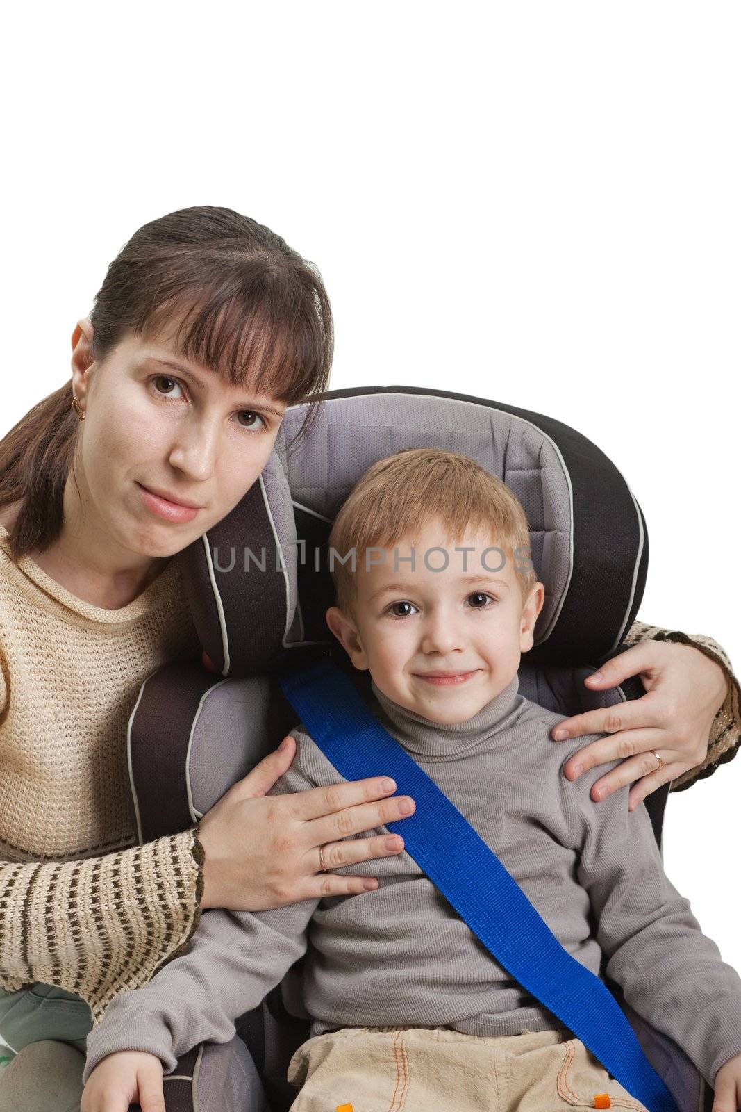 Mother and little child on vehicle car safety seat