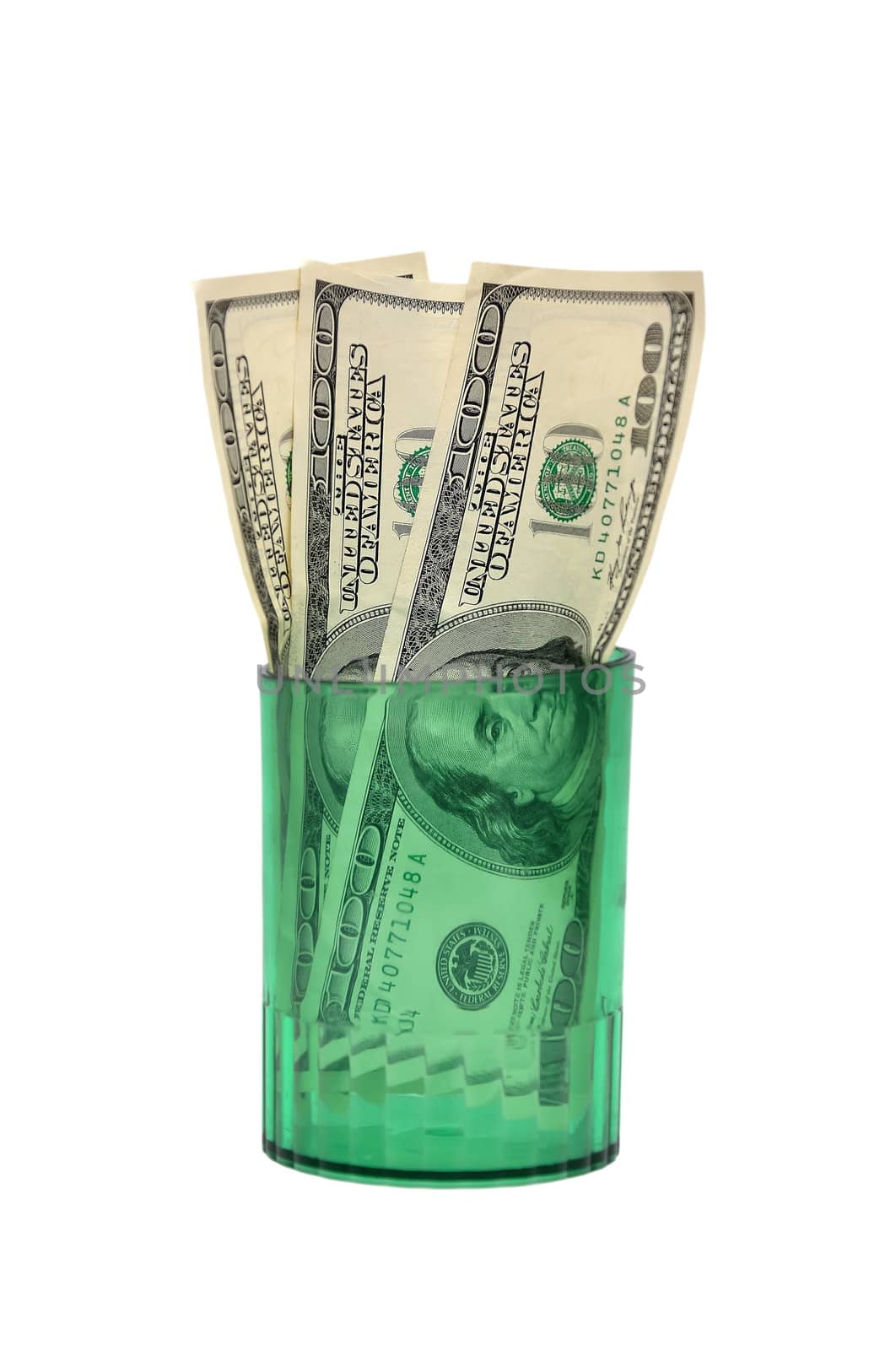 dollars in  glass on a white background