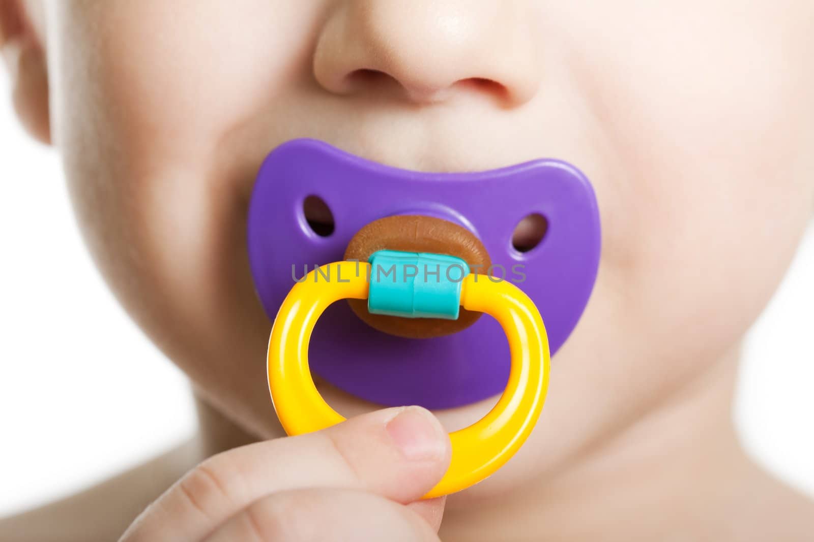 Child with baby pacifier by ia_64