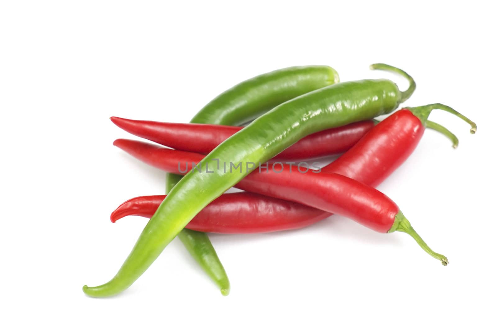 Red hot chili peppers on white background