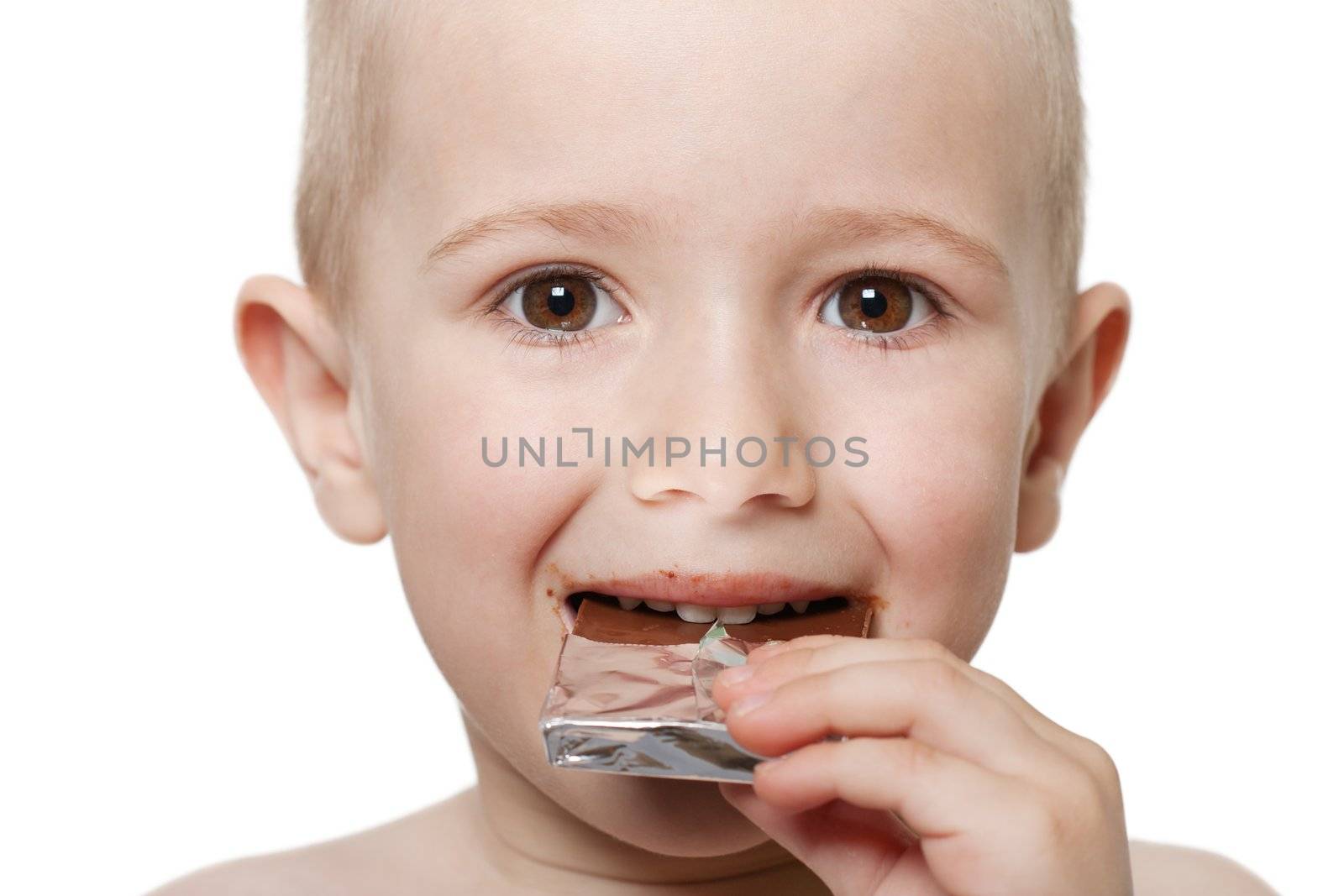 Little child holding sweet chocolate candy food