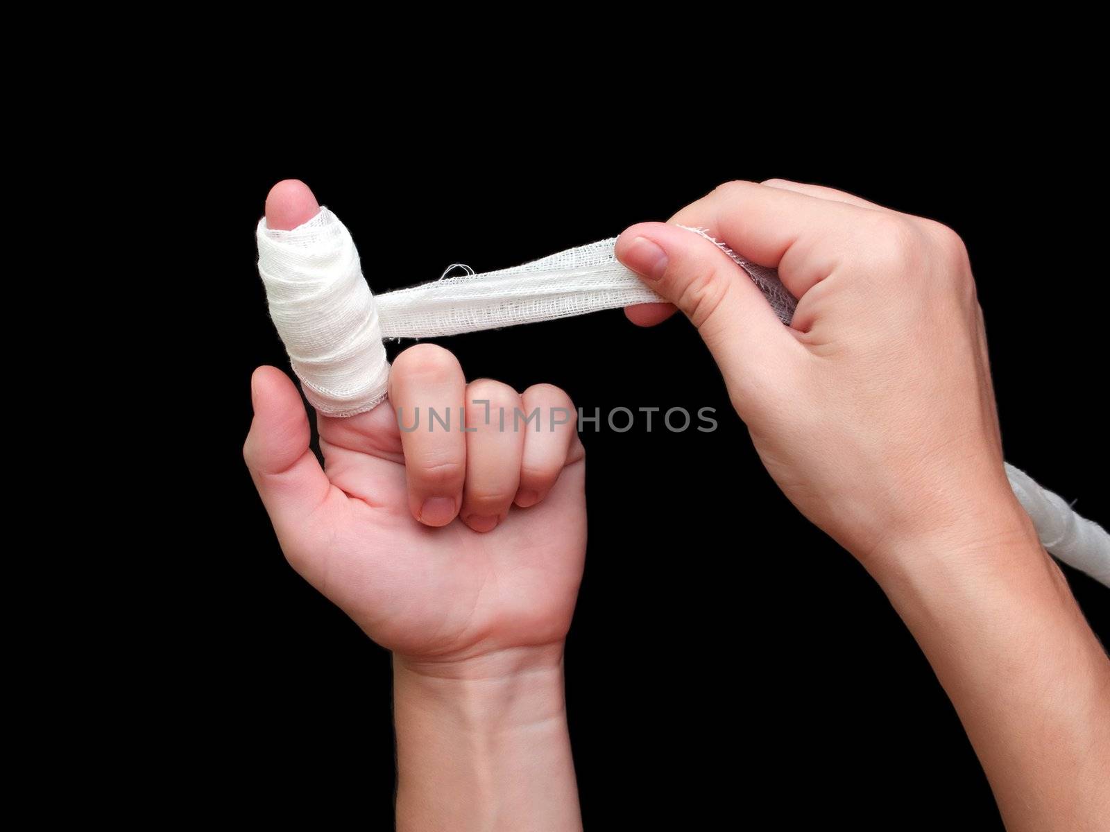 White medicine bandage on human injury hand finger