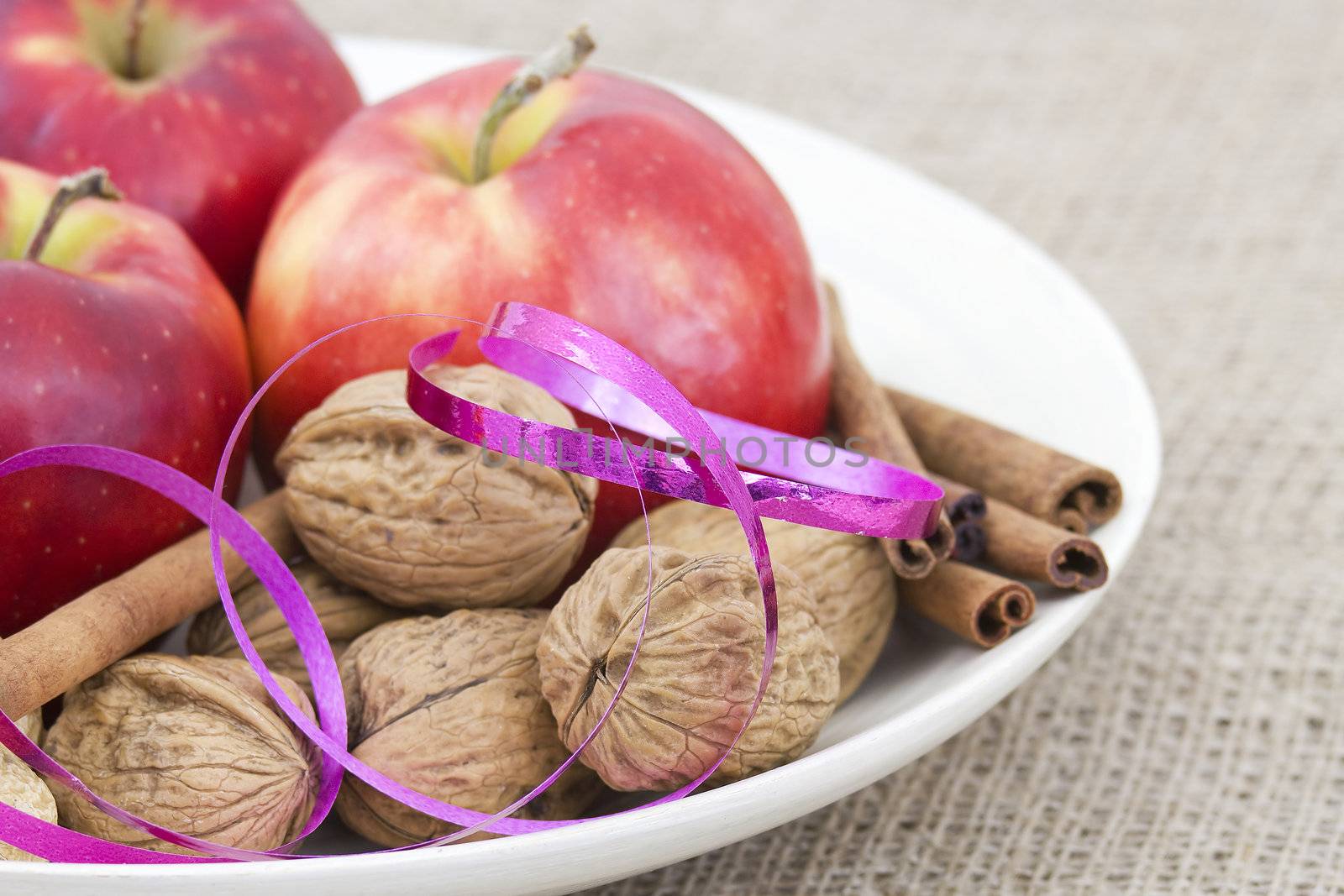 apples, walnuts and cinnamon sticks