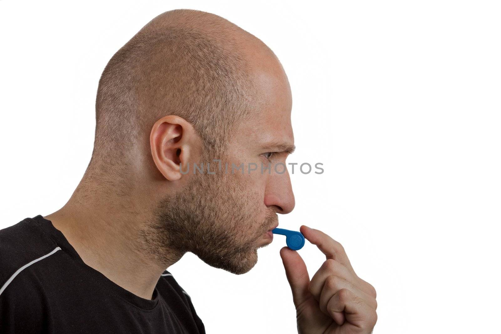 Soccer sport men referee blowing whistle on white