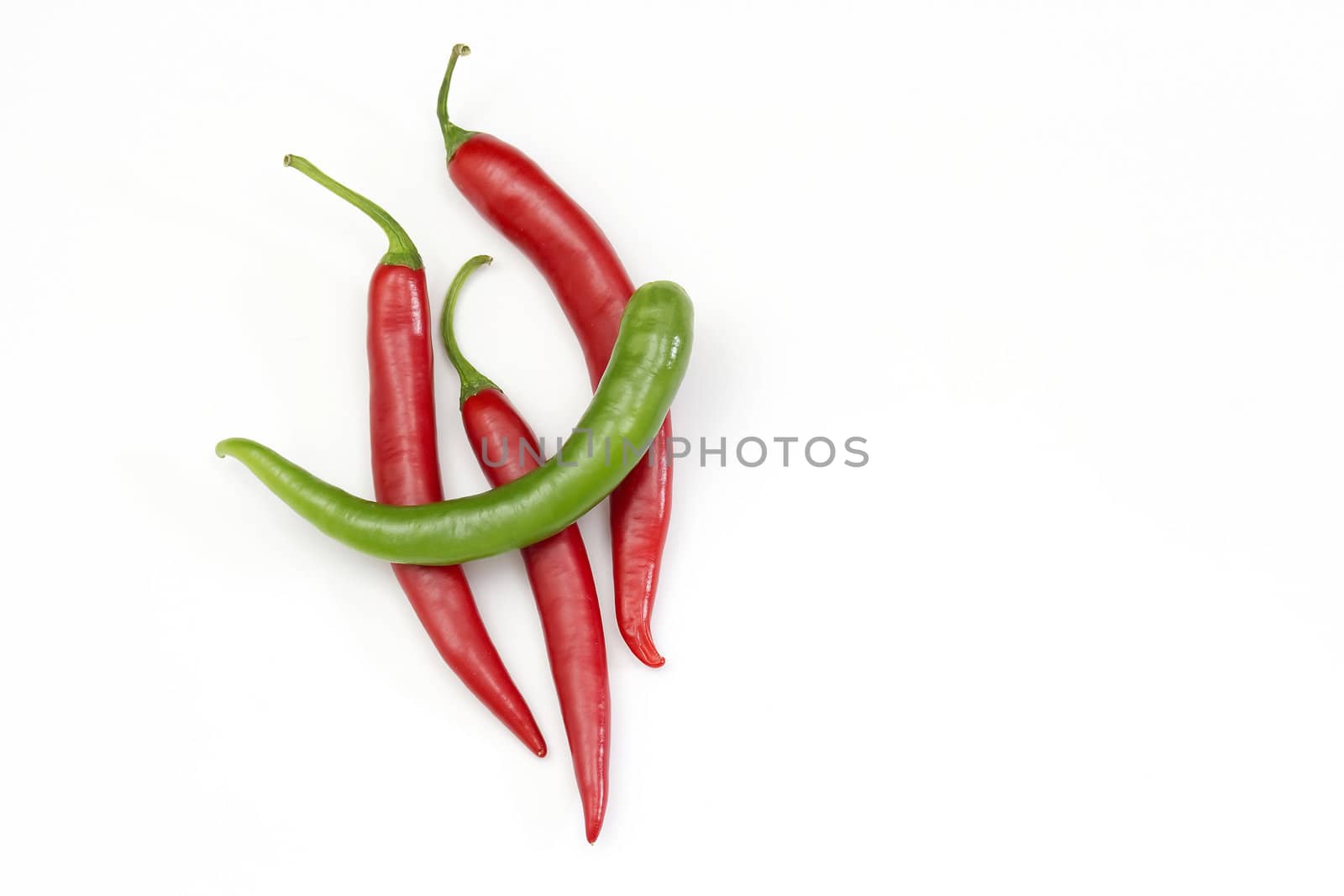 Red hot chili peppers on white background