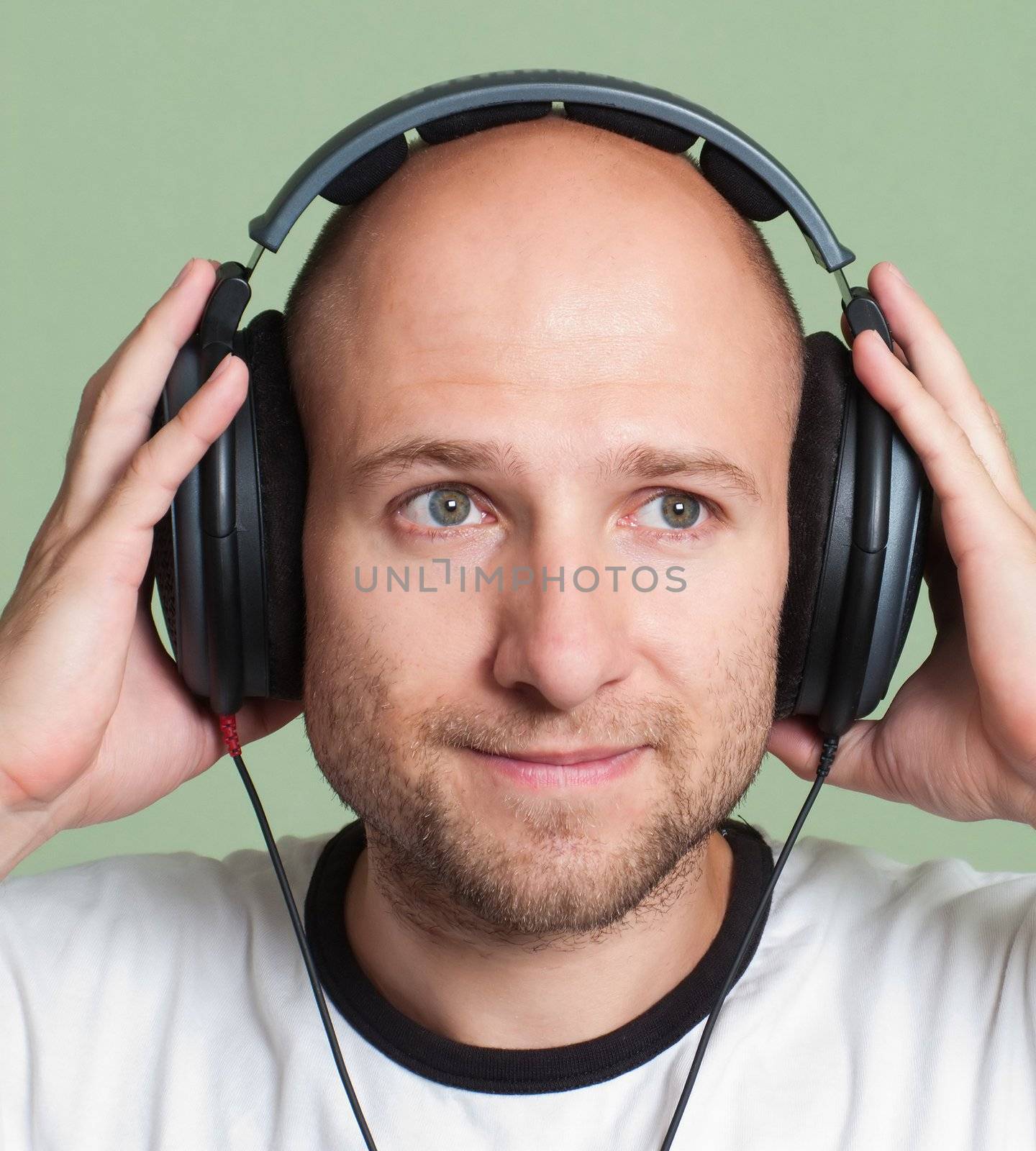Adult men in sound headphones listening mp3 music