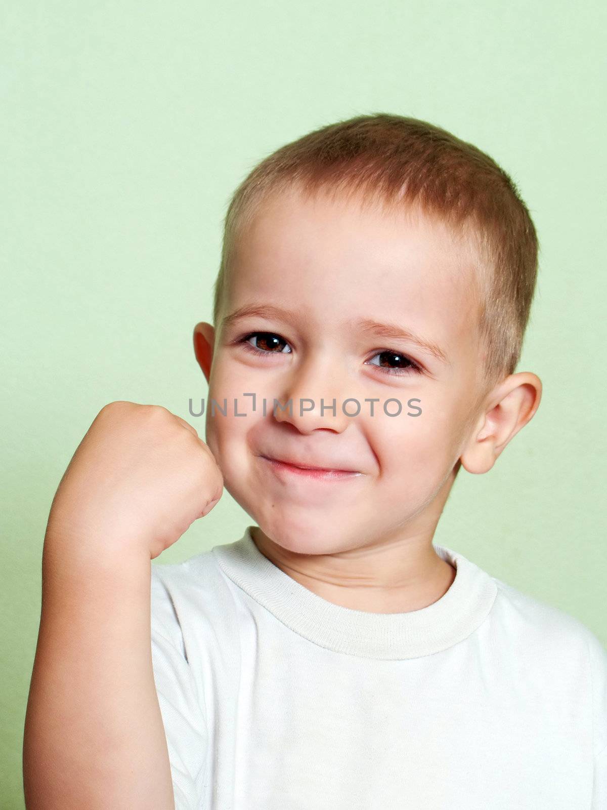 Little human child shake fist for threat warning