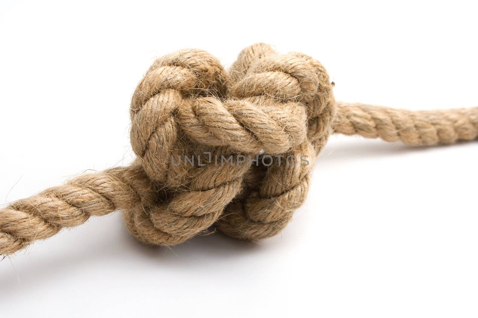 Tied up rope knot isolated on white background