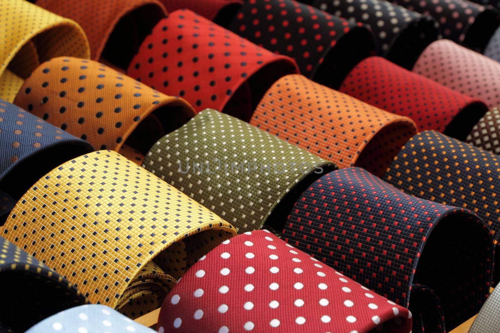 silk  dotted ties on market in Italy