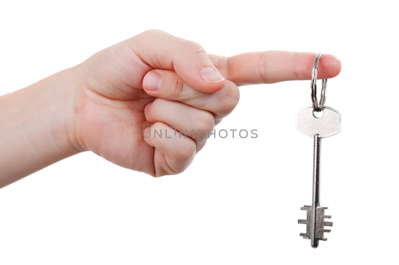 Human hand holding steel metal house door lock key