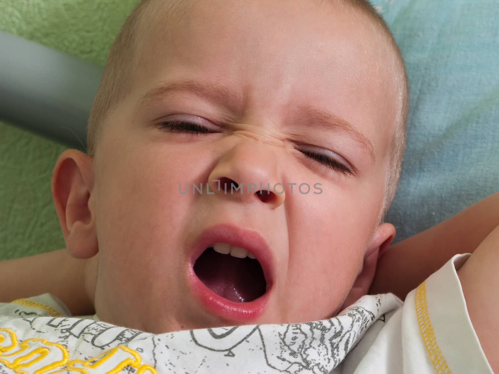 Little tired human child yawning cute face