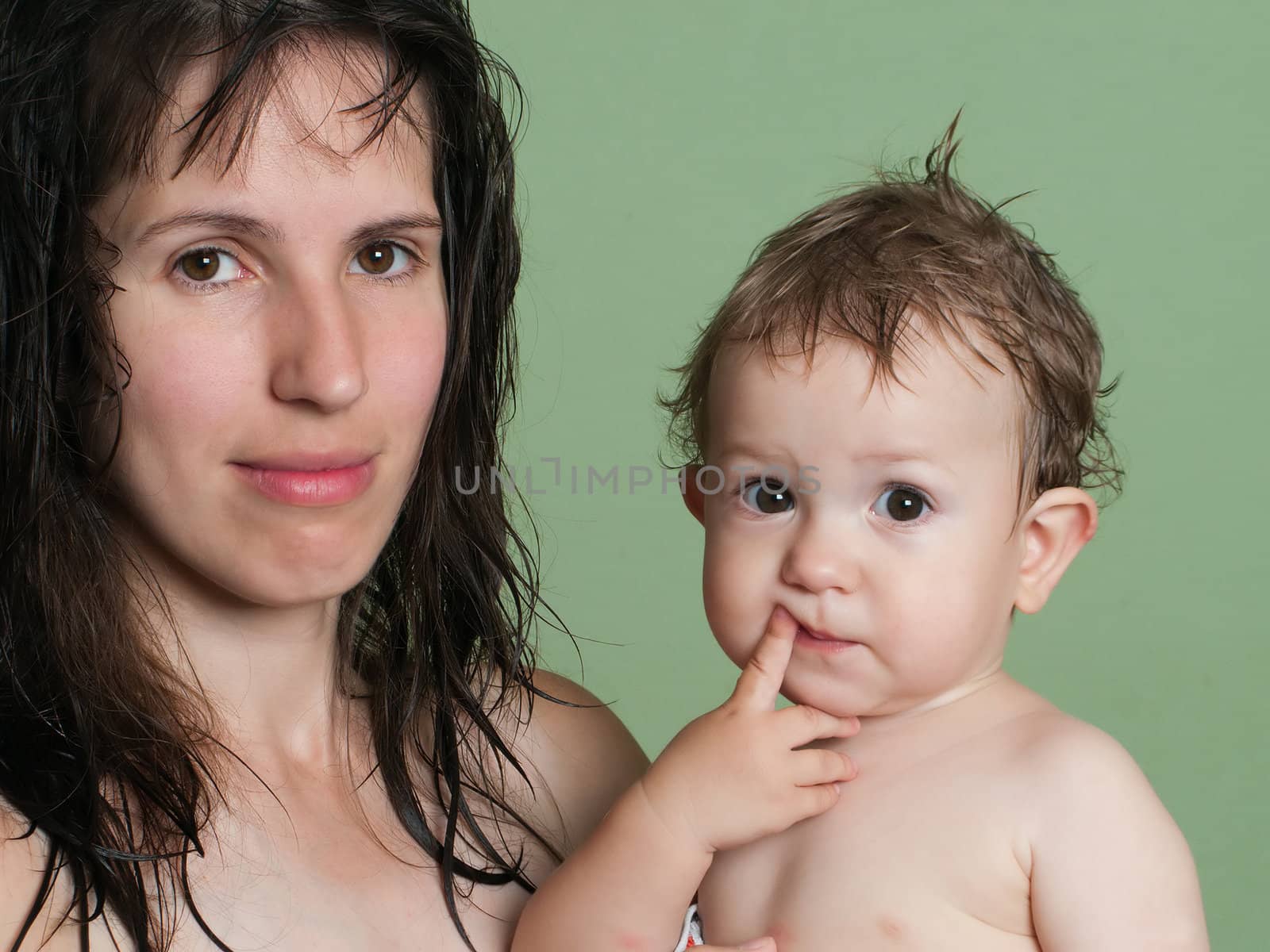 Smiling mother and little child - family happiness