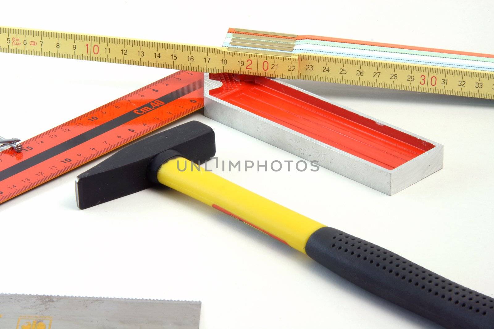 construction concepts carpenter tools meter hammer, nails, angle meter, hand saw