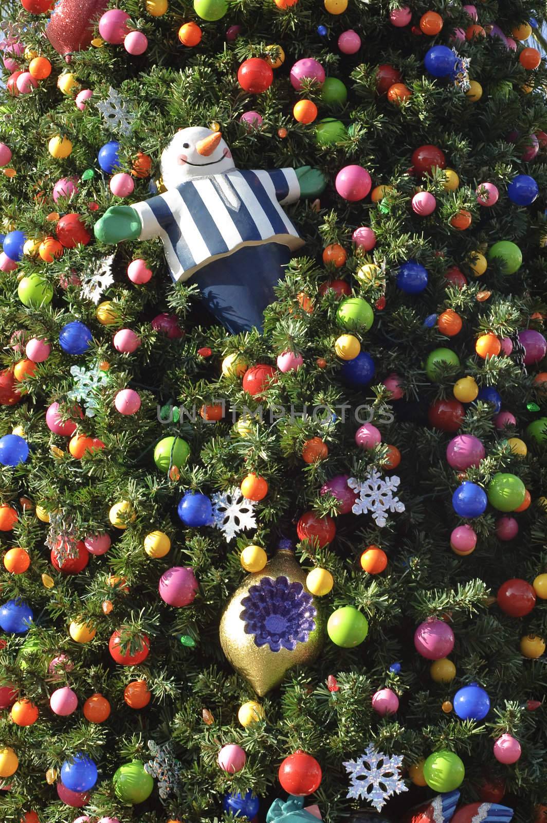 Close-up of Christmas tree decorated with ornaments outside