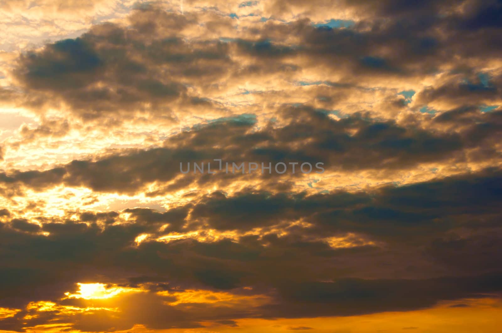 Colorful dramatic sky with Clouds at Sunset