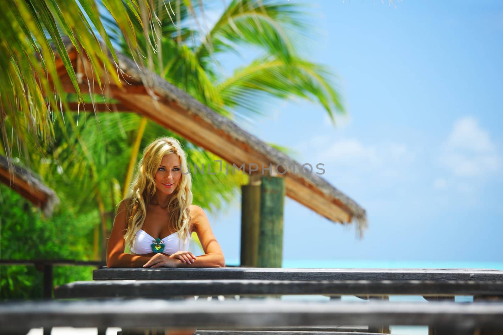 woman in a tropical cafe