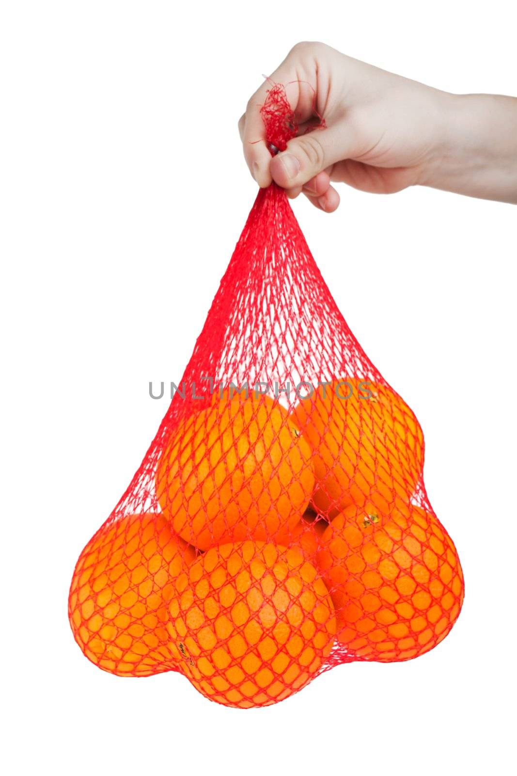 Hand holding healthy eating orange fruit food bag