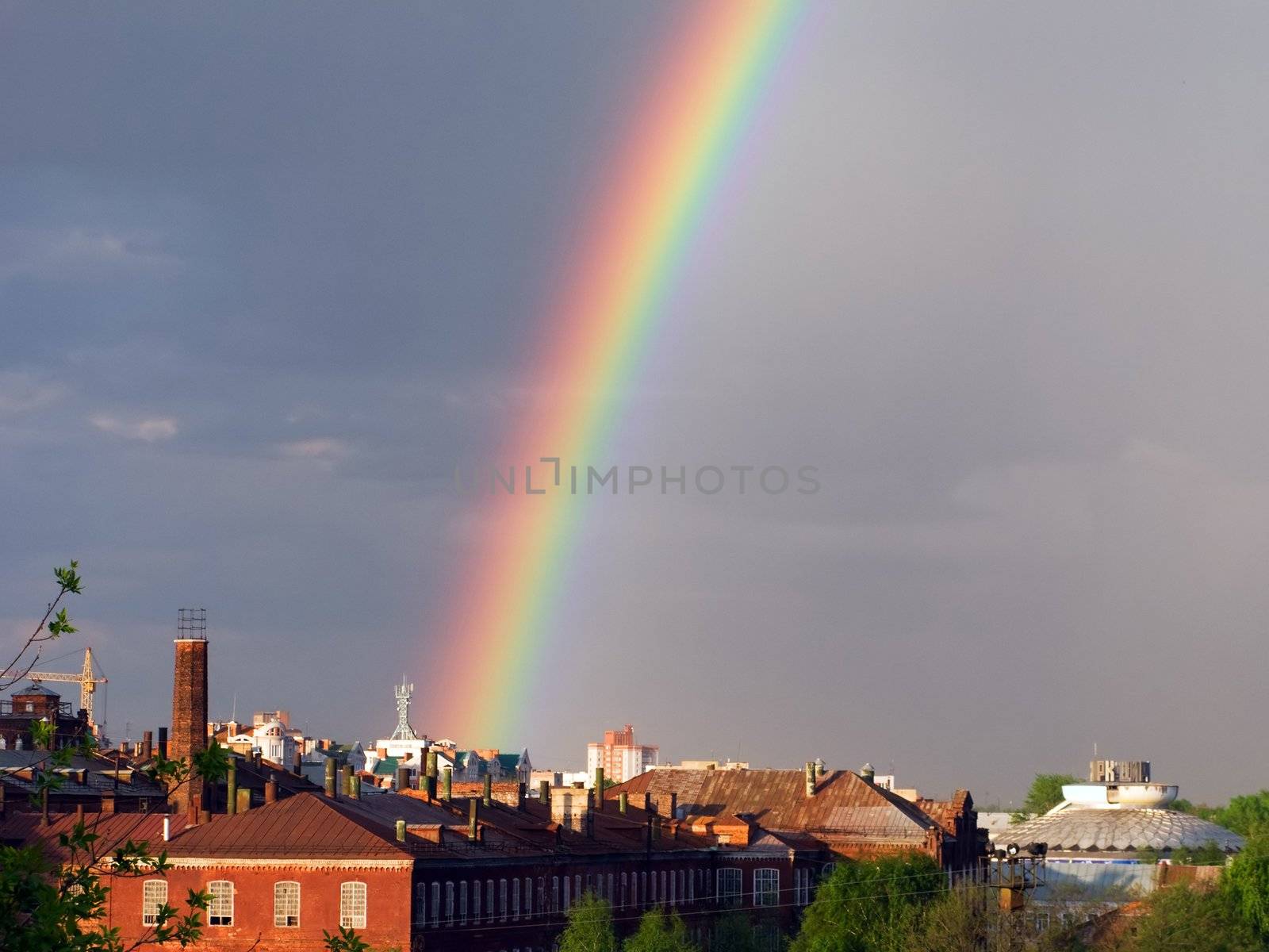 Rainbow multi color image on blue sky rain nature